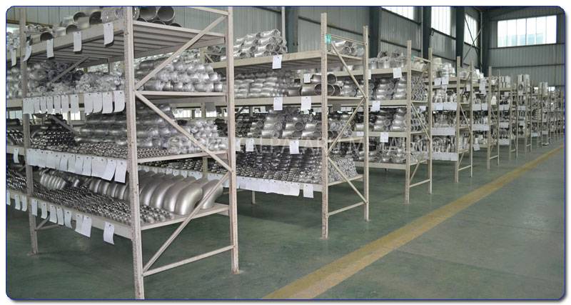 Original Photograph Of Stainless Steel 317L Pipe fittings At Our Warehouse Mumbai, India